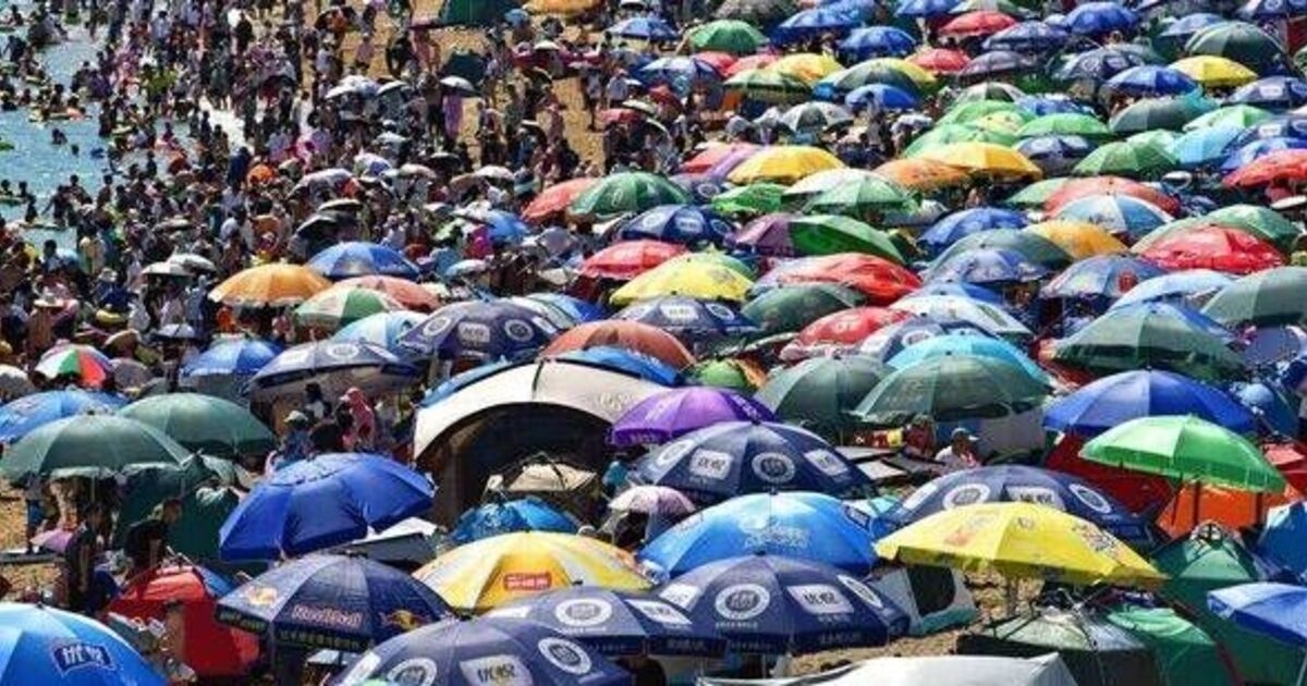 World's 'most crowded beach' is less than a kilometre long and has 30,000 visitors a day