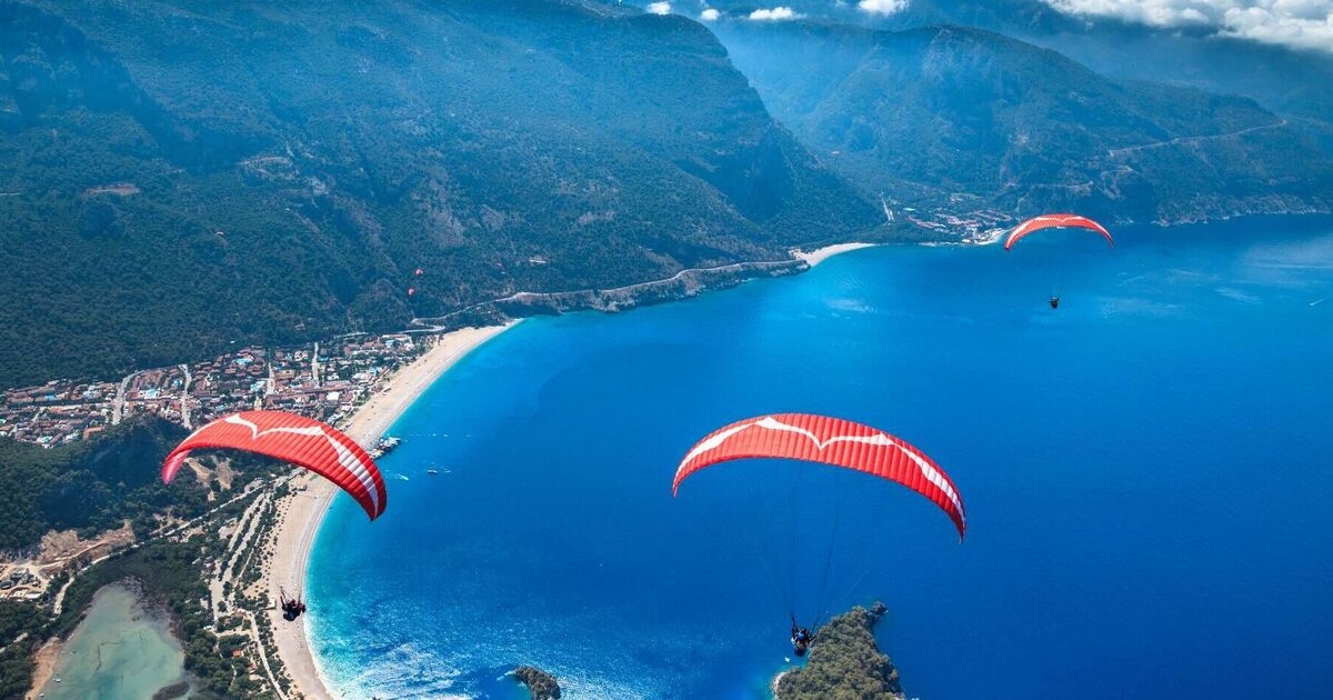Brit tourist, 22, plunges to death in horror paragliding crash after parachute fails