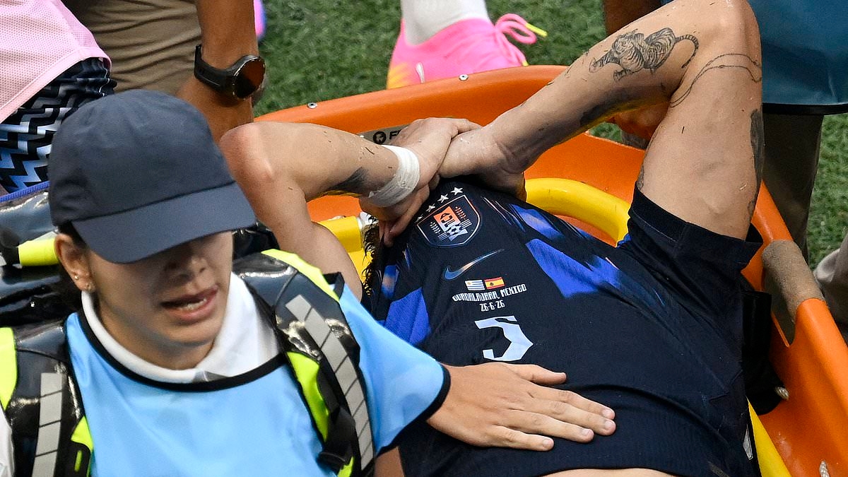 Heartbroken Manuel Ugarte leaves the pitch in tears as he is stretchered off on World Cup duty with Uruguay - leaving Man United facing a nervous wait over star's fitness which could put huge midfield overhaul at risk