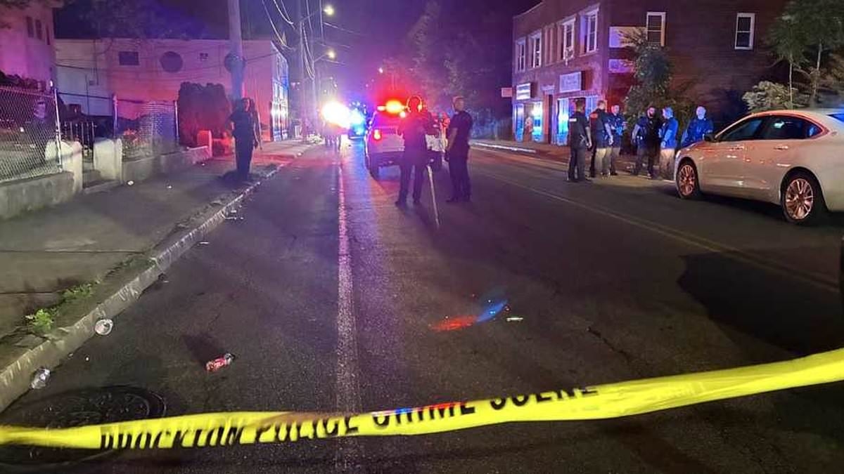 Three gunshots, a stolen moped and blood pouring onto the streets where World Cup fans were partying: RIATH AL-SAMARRAI witnesses a terrifying reminder of America's thinly veiled brutal side that lurks behind this tournament