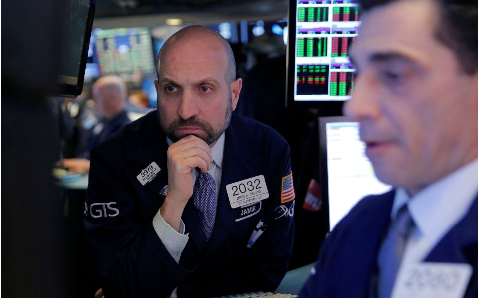 Wall Street opens in the green, with Tesla soaring more than 5%