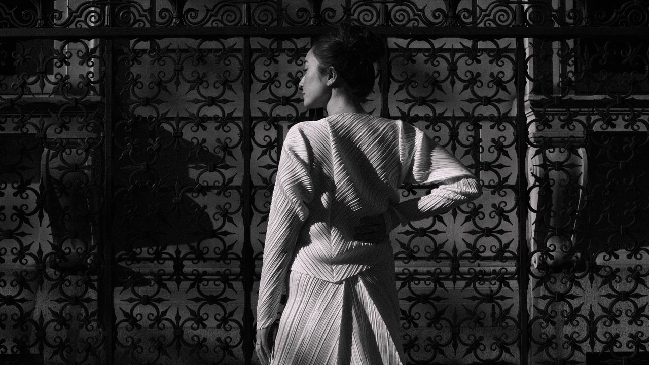 This bride wore her mother's 1980s Issey Miyake wedding look