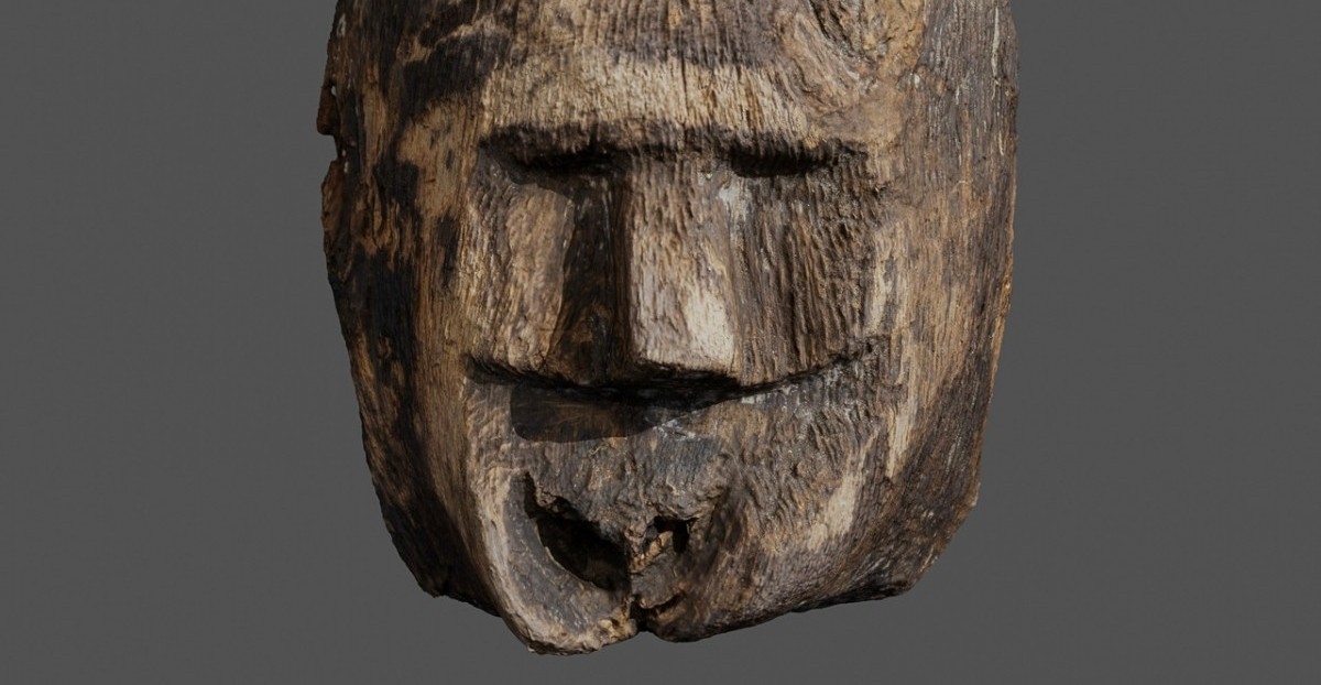 Thousand-year-old wooden face sculpture found at bottom of Polish lake