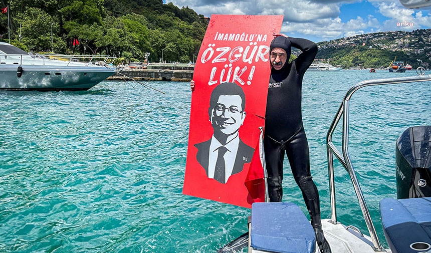 The Mayor of Adalar opened a banner under the sea saying “Freedom for İmamoğlu”