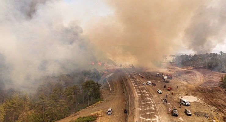 The Ministry sent 5 million lira in aid to Bursa, where the fire has been raging for four days.