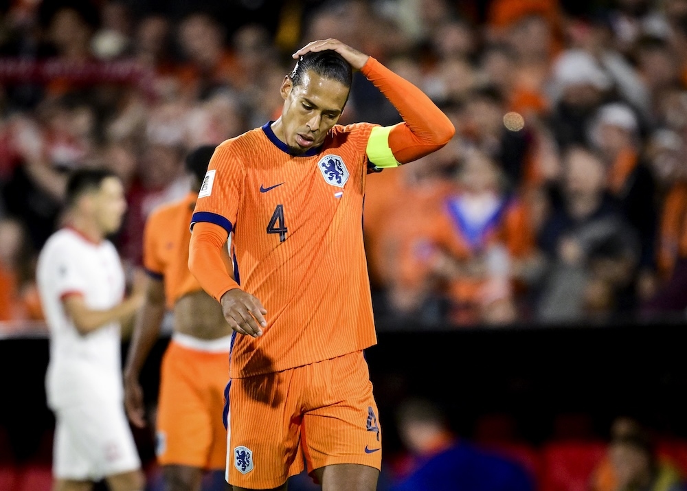 The Netherlands held to 1-1 draw by Poland but stay top of group