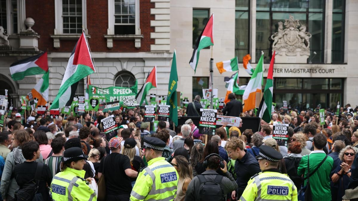 A Kneecap member appears in a British court on terrorism charges.