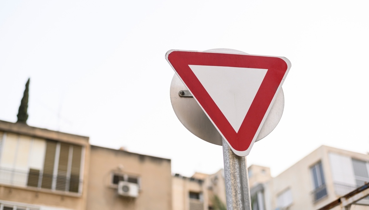 Priority signs: give way, stop, controlled intersections